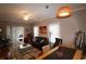 Comfortable living area with ample seating, natural light, and access to a screened-in porch at 2090 Cross Gate Blvd # 301, Myrtle Beach, SC 29575