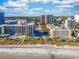 Stunning aerial view of the beachfront property, showcasing the buildings and direct beach access at 210 75Th Ave N # 4042, Myrtle Beach, SC 29572