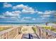 Directly on the beach, this home has a private walkway to the beautiful sand and surf at 210 75Th Ave N # 4042, Myrtle Beach, SC 29572