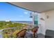 Relax on the balcony and enjoy ocean views, with comfortable high-top seating for two at 215 77Th Ave. N # 702, Myrtle Beach, SC 29572