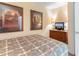 Cozy bedroom featuring a TV, dresser, and decorative art at 215 77Th Ave. N # 702, Myrtle Beach, SC 29572