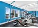Bright fitness center with modern equipment, large windows, and city views at 215 77Th Ave. N # 702, Myrtle Beach, SC 29572