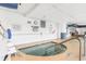 Indoor hot tub area with clean, well-maintained space with safety railings and clear signage at 215 77Th Ave. N # 702, Myrtle Beach, SC 29572