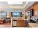 Kitchen with stainless steel appliances, granite countertops, and an opening to the living room area at 215 77Th Ave. N # 702, Myrtle Beach, SC 29572