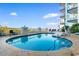 Beautiful outdoor pool offers ocean views and comfortable lounge seating at 215 77Th Ave. N # 702, Myrtle Beach, SC 29572