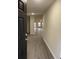 Inviting entryway with wood-look floors leading into an open-concept living space at 2247 Union Church Rd., Little River, SC 29566