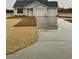 Charming single-Gathering home featuring a two-car garage and freshly laid lawn at 2247 Union Church Rd., Little River, SC 29566