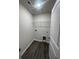 A compact laundry room with connections and overhead lighting, perfect for efficient chores at 2247 Union Church Rd., Little River, SC 29566
