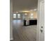 Modern living space featuring an open floor plan with kitchen and dining area, and outdoor views at 2247 Union Church Rd., Little River, SC 29566