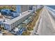 A high angle aerial shot of a condo resort, located right on the beach with pools and beach access at 2311 S Ocean Blvd. # 430, Myrtle Beach, SC 29577