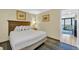 Comfortable bedroom featuring a king-sized bed and access to a private balcony at 2311 S Ocean Blvd. # 430, Myrtle Beach, SC 29577