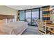 Comfortable bedroom with a private balcony and ocean view at 2311 S Ocean Blvd. # 430, Myrtle Beach, SC 29577