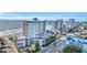 Stunning aerial view of the Compass Cove Resort exterior, showcasing its prime beachfront location at 2311 S Ocean Blvd. # 430, Myrtle Beach, SC 29577