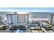Expansive aerial view showcasing Compass Cove's elegant facade and ocean view at 2311 S Ocean Blvd. # 430, Myrtle Beach, SC 29577