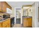 Well-equipped kitchenette featuring a sink and a stovetop oven at 2311 S Ocean Blvd. # 430, Myrtle Beach, SC 29577