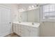 Bathroom showcasing a dual sink vanity, ample storage, and modern fixtures for everyday convenience at 247 Dempsey Dr., Loris, SC 29569