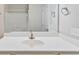 Bathroom featuring white vanity, large mirror, and shower/tub combination with chrome fixtures at 247 Dempsey Dr., Loris, SC 29569