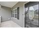 Stylish front door with a decorative glass insert, enhancing the home's entrance and curb appeal at 247 Dempsey Dr., Loris, SC 29569