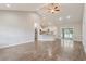 Spacious living room featuring wood-look floors and an open floor plan at 247 Dempsey Dr., Loris, SC 29569