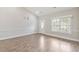 Inviting living room filled with natural light, with wide-plank flooring at 247 Dempsey Dr., Loris, SC 29569