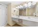 Well-lit bathroom features double sinks, large mirror, and modern fixtures at 2501 S Ocean Blvd. # 831, Myrtle Beach, SC 29577