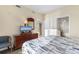 Cozy bedroom features a TV, dresser, and easy access to bathroom and hallway at 2501 S Ocean Blvd. # 831, Myrtle Beach, SC 29577