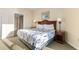 Comfortable bedroom with bedside table, lamps, and a convenient ensuite bathroom at 2501 S Ocean Blvd. # 831, Myrtle Beach, SC 29577