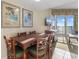 Dining area with seating for six, ocean view, and access to the balcony at 2501 S Ocean Blvd. # 831, Myrtle Beach, SC 29577