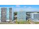 Exterior view of the condos featuring multiple floors, ocean views, and exterior pools at 2501 S Ocean Blvd. # 831, Myrtle Beach, SC 29577
