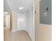 Hallway with tile flooring, a closet, and a door leading to another room at 2501 S Ocean Blvd. # 831, Myrtle Beach, SC 29577