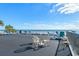 Outdoor deck area with seating and lounge chairs with great views of the ocean and horizon at 2501 S Ocean Blvd. # 831, Myrtle Beach, SC 29577