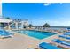 Outdoor pool with a stairwell to the upper level and plenty of lounge chairs for relaxing at 2501 S Ocean Blvd. # 831, Myrtle Beach, SC 29577