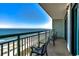 Ocean view from balcony with railings and patio furniture at 3000 Ocean Blvd. N # 508, Myrtle Beach, SC 29577