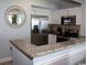 Well-equipped kitchen with granite countertops, stainless steel appliances, and ample cabinet space at 3000 Ocean Blvd. N # 508, Myrtle Beach, SC 29577