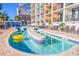 An attractive lazy river winds past lounge chairs and palm trees at this resort at 3000 Ocean Blvd. N # 508, Myrtle Beach, SC 29577