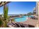 Resort-style outdoor pool with lounge chairs and palm trees, overlooking the beach and ocean at 3000 Ocean Blvd. N # 508, Myrtle Beach, SC 29577