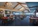 Elegant restaurant dining room with large windows offering views of the ocean and beach at 3000 Ocean Blvd. N # 508, Myrtle Beach, SC 29577