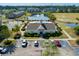 Aerial view of a community featuring a pool, clubhouse, and well-maintained landscaping at 334 Kiskadee Loop # 18-L, Conway, SC 29526