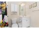 Bright bathroom with cabinet, toilet and colorful butterfly themed shower curtain at 334 Kiskadee Loop # 18-L, Conway, SC 29526