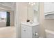 Cozy bathroom featuring modern vanity, cabinet, toilet, and view to bedroom at 334 Kiskadee Loop # 18-L, Conway, SC 29526
