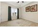 Bright bedroom featuring neutral walls, window with natural light, and classic ceiling fan at 334 Kiskadee Loop # 18-L, Conway, SC 29526