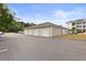A row of detached garages with ample parking and a clean, organized look at 334 Kiskadee Loop # 18-L, Conway, SC 29526
