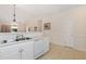 Bright kitchen featuring white appliances, cabinets, and tile flooring at 334 Kiskadee Loop # 18-L, Conway, SC 29526
