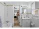 Bathroom with shower-tub combo connected to bedroom with bunkbeds at 337 59Th Ave. N, North Myrtle Beach, SC 29582