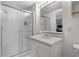 Bathroom featuring shower and vanity with overhead lighting at 337 59Th Ave. N, North Myrtle Beach, SC 29582