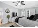 Cozy bedroom with neutral tones, a ceiling fan, and natural light at 337 59Th Ave. N, North Myrtle Beach, SC 29582