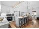Modern kitchen with white cabinetry, stainless steel appliances, and a large island at 337 59Th Ave. N, North Myrtle Beach, SC 29582