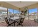 Cozy screened patio with outdoor seating, perfect for enjoying the view at 337 59Th Ave. N, North Myrtle Beach, SC 29582