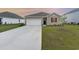 Charming single-story home featuring a manicured lawn, driveway, and an attached one-car garage at 376 Black Pearl Way, Myrtle Beach, SC 29588