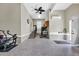 Garage with mini kitchenette, stairway, and door with exterior access to the yard at 4074 Center Rd., Georgetown, SC 29440